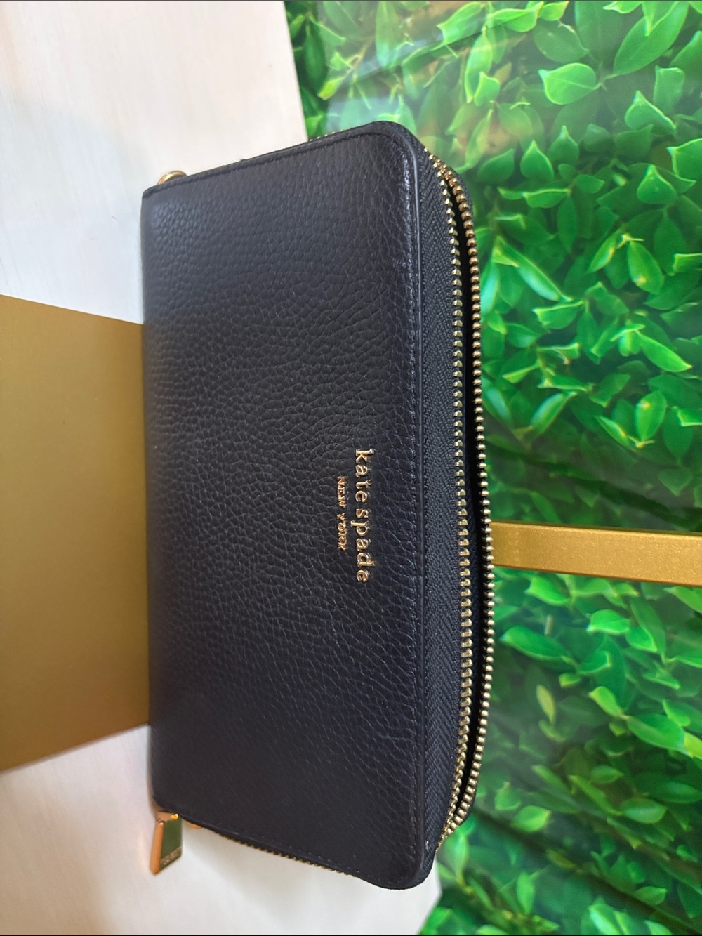 kate spade black pebbled leather zip-around wallet with gold logo